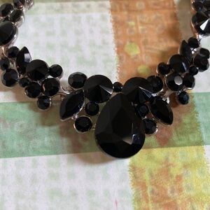 Black faceted gemstone necklace with matching earrings